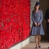 Catherine, Duchess of Cambridge wears her Michael Kors tweed coat for the first time on ANZAC Memorial Day in Canberra, Australia in 2014.