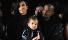 Kim Kardashian, North West and Kanye West attend the Alexander Wang Fashion Show on Feb. 14, 2015 in New York City. 