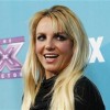 Judge Britney Spears poses at the party for the television series ''The X Factor'' finalists in Los Angeles, California November 5, 2012.